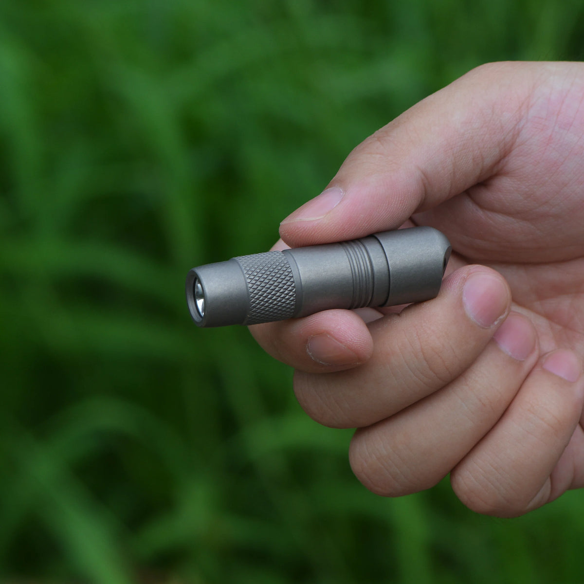 FIELDLUME T3 pure titanium machined finish close-up