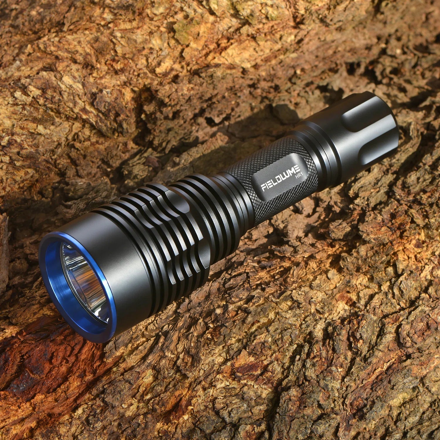 FIELDLUME HR1 red hunting light resting outdoors