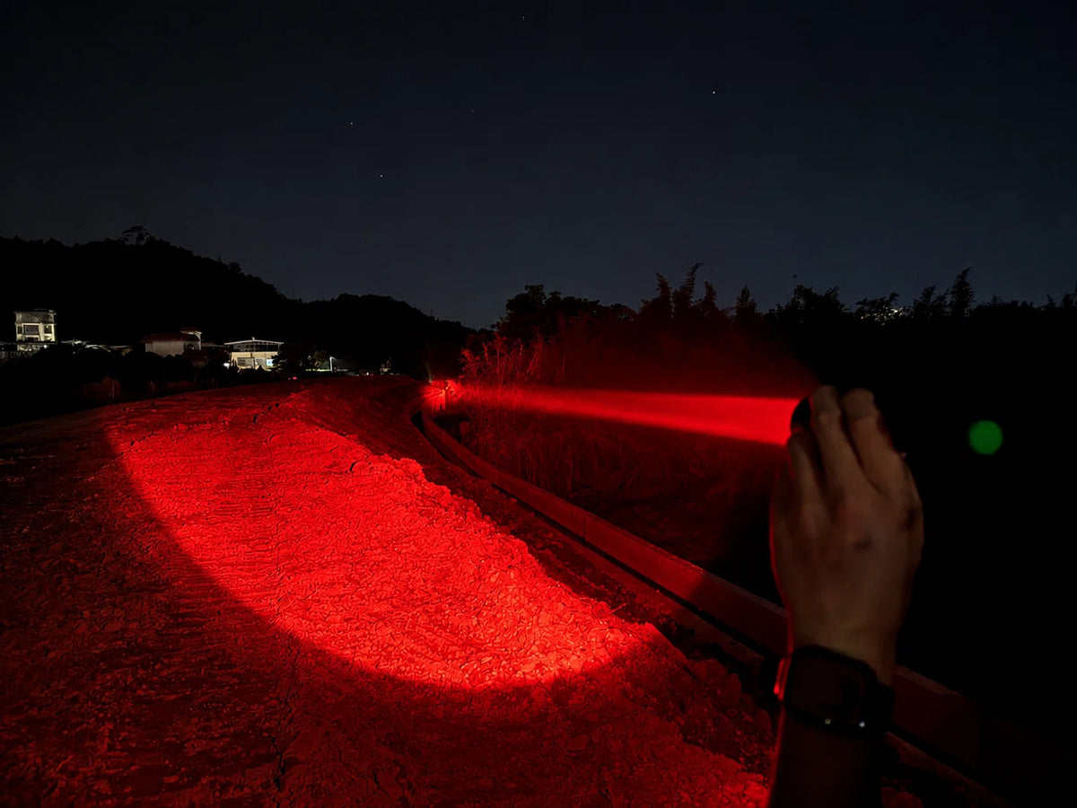 HR1 red light illuminating an outdoor area at night