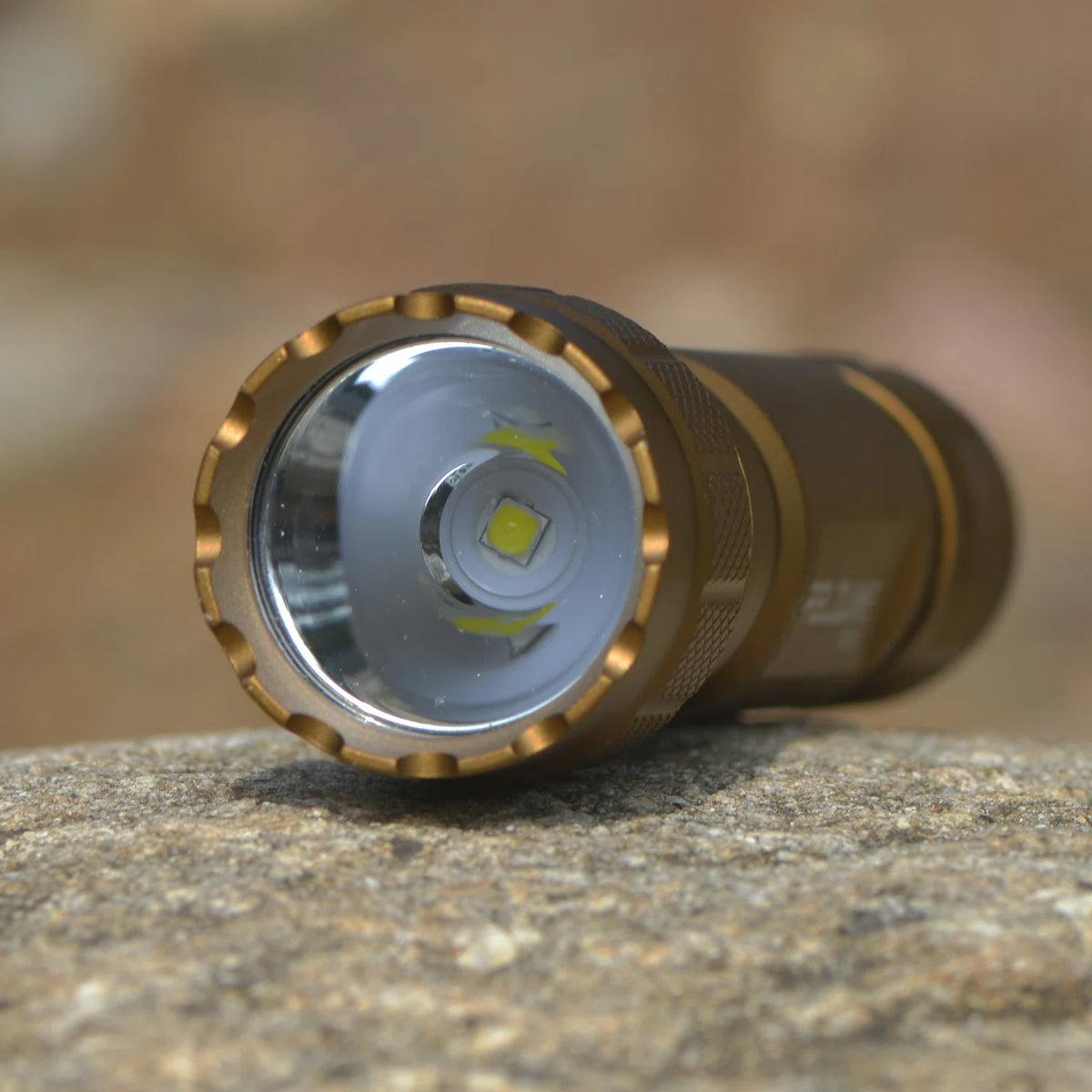 TAC10 Tan flashlight LED reflector close-up